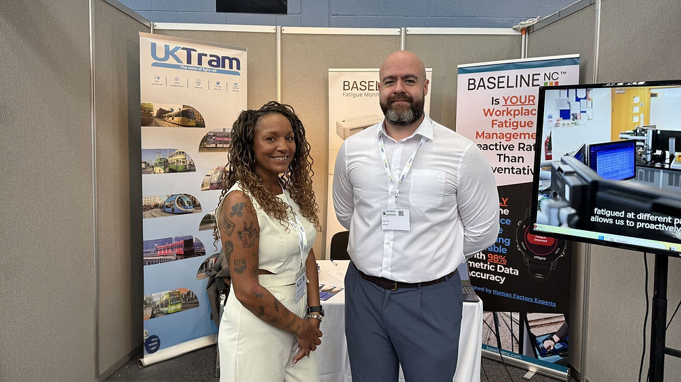 Lorraine - Business Manager, and Dan - Knowledge Manager of UKtram stand bu the UKTram Stand at the Latest Light Rail Conference