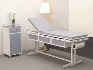 Examination couch with built-in drawers in a modern clinic setup