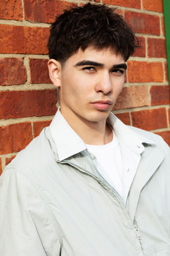 Mixed Korean Model Eugene in front of wall