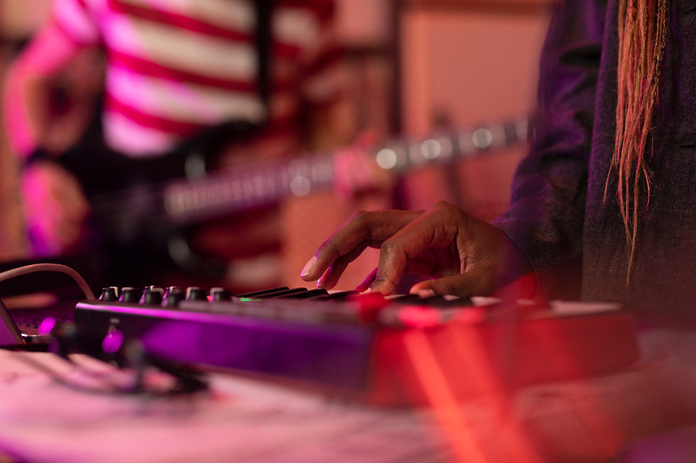 defocused-keyboard-player-local-music-event.jpg