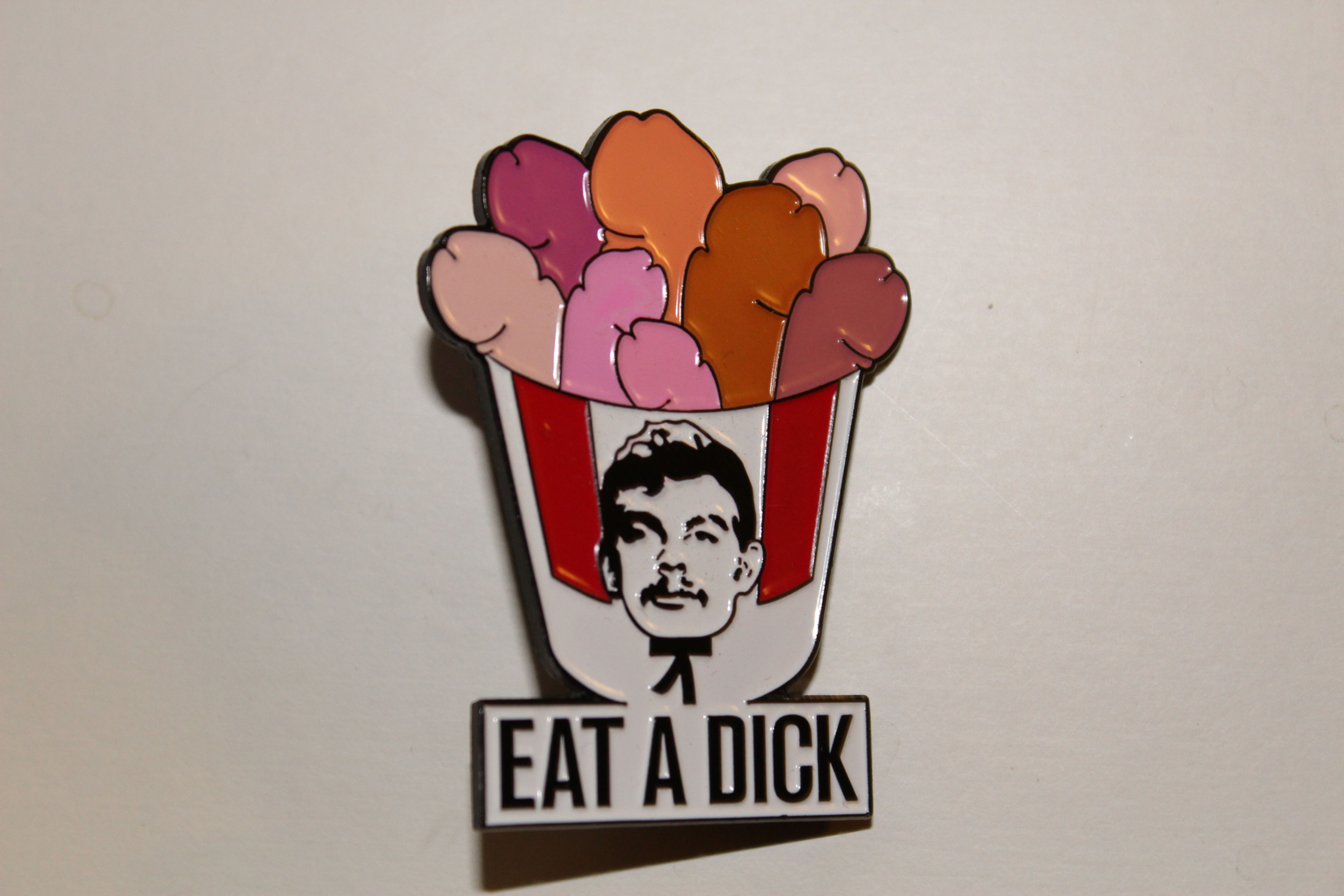 EAT A DICK ENAMEL PIN