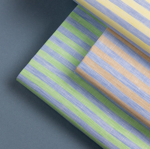 Green, yellow and sand striped linen shirting fabrics for warm-weather dressing
