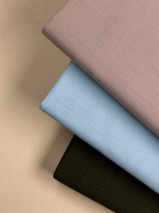 Soft neutral Thomas Mason silk blend shirting cloths in taupe, pale blue and black