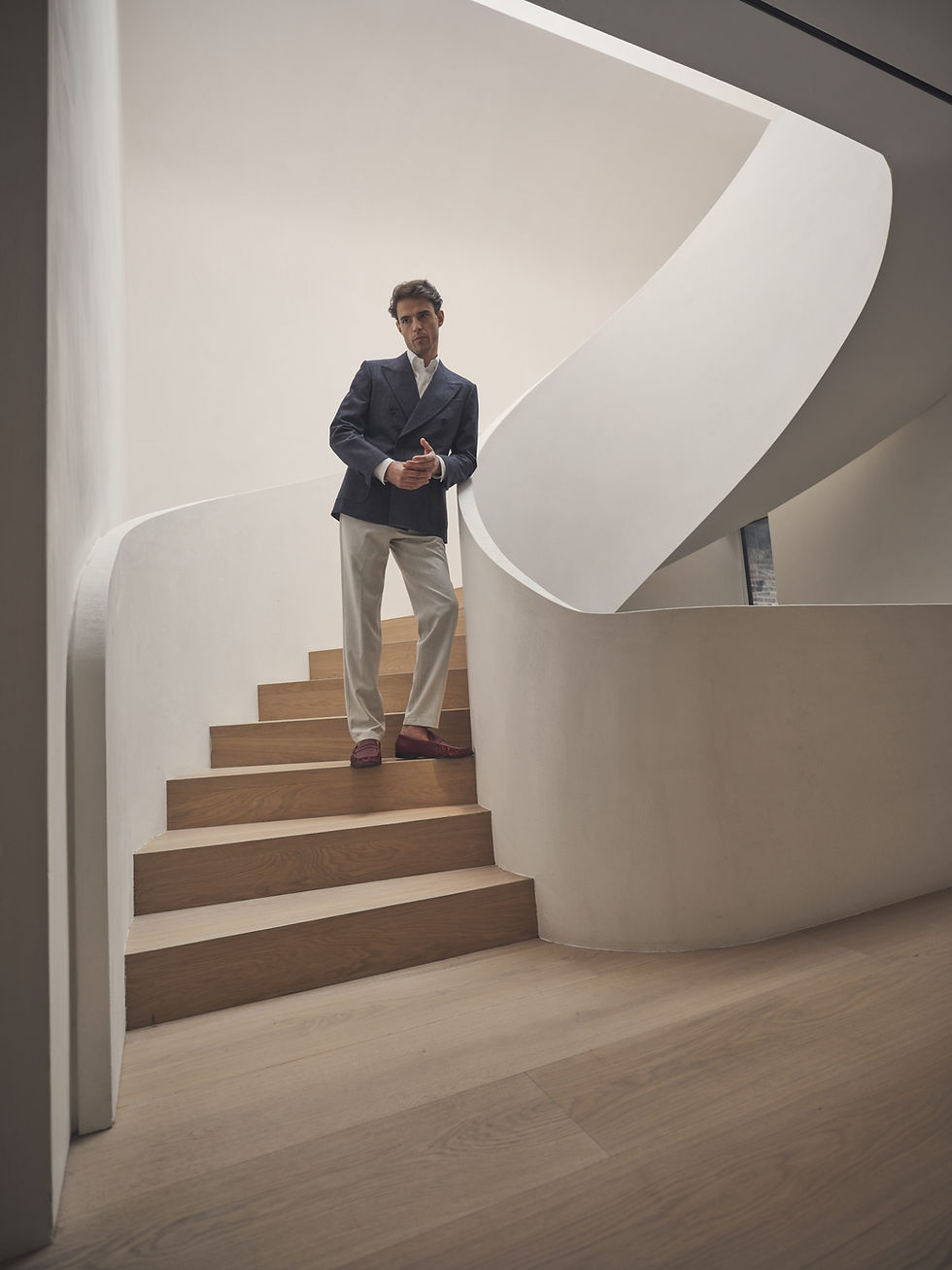 Thumbnail: Model wearing an outfit which includes a wool denim double-breasted blazer