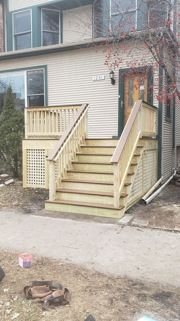 Front porch with Trex composite decking, rail cap, and stair treads with #1 treated risers, railings