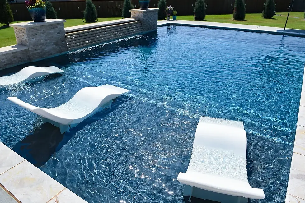 Custom pool built by Signature Custom Pools in Norman Oklahoma with a modern water system