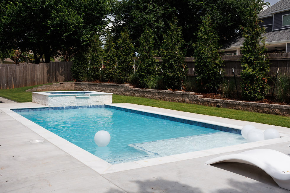 Well-maintained custom pool built by Signature Custom Pools in Norman Oklahoma