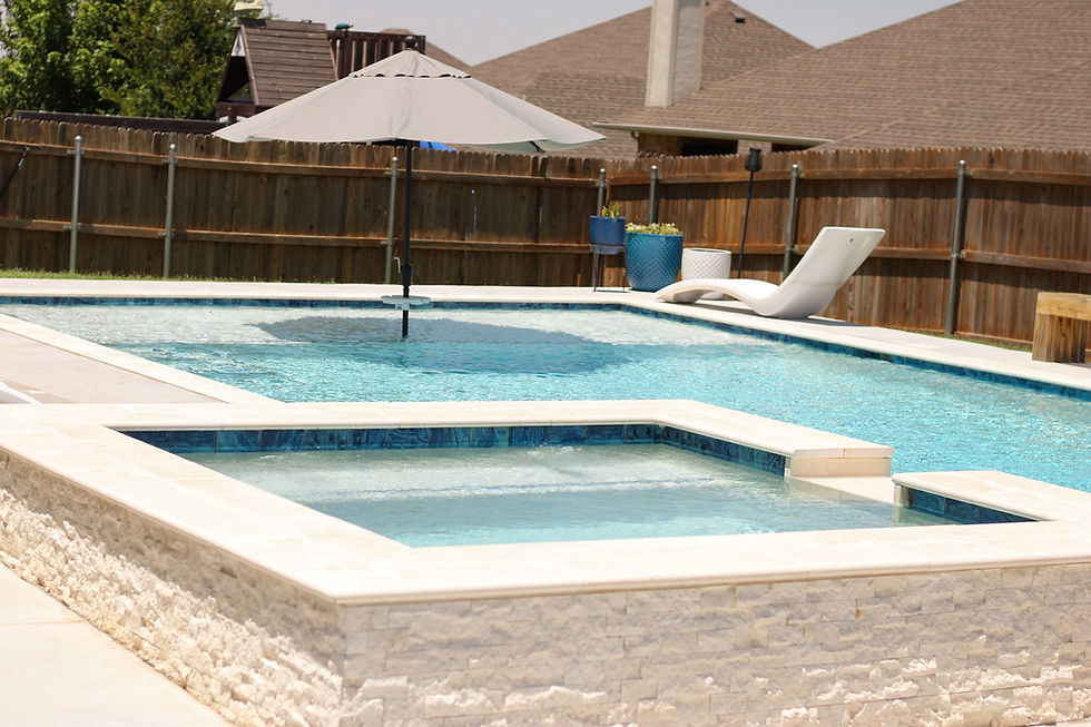 Custom inground pool built by Signature Custom Pools for an Edmond Oklahoma home