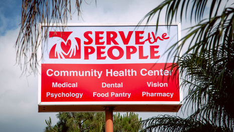 Billboard with words serve the people