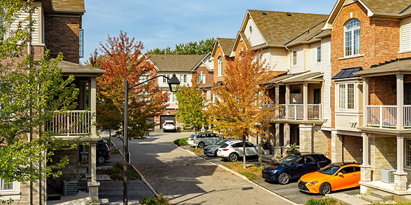 Autumn townhouses, parked cars