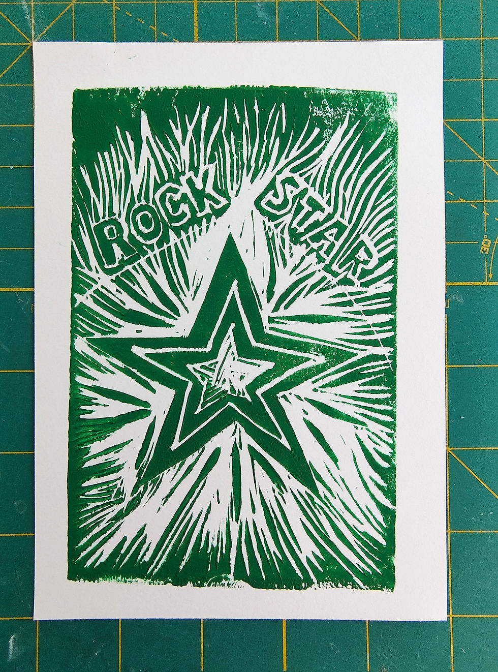 Thumbnail: Green blockprint of a star with the words "rock star" above - this is for a digital download file of all three colors