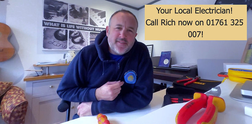 Rich Speller - Local Electrician sitting in his office 