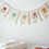 Thumbnail: Colourful handmade felt bunting decoration in kids’ bedroom