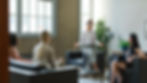 young-businesswoman-leading-informal-meeting-with-2024-08-22-22-08-36-utc.jpg