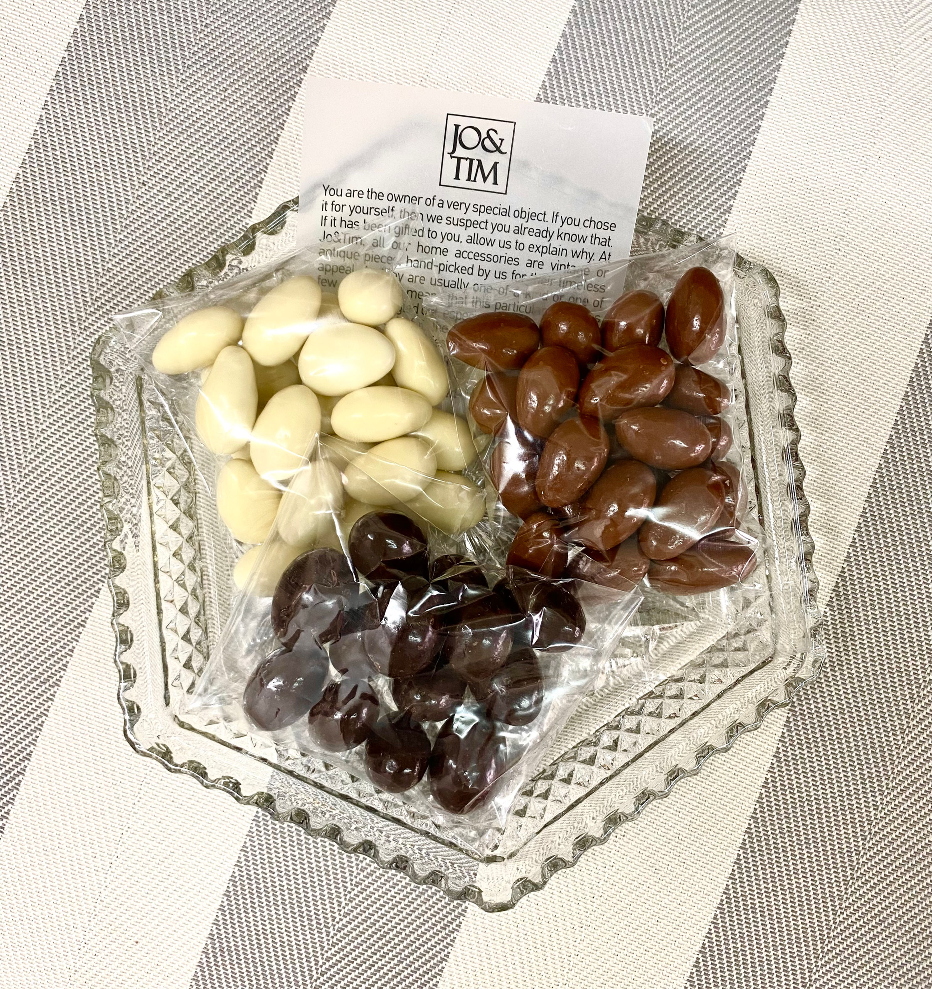 Vintage crystal hexagonal serving dish paired with chocolate coated almonds