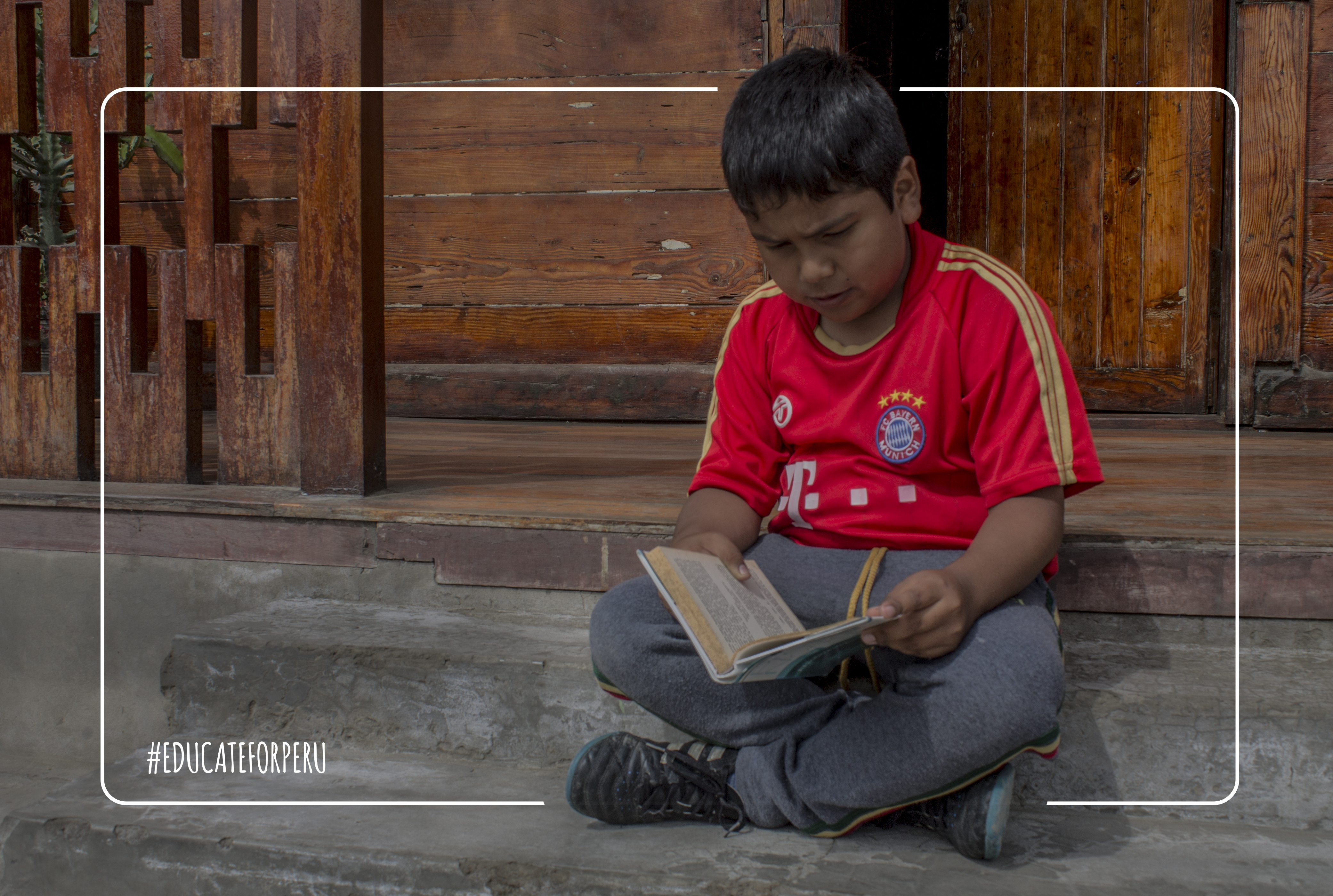 Child reading thanks to Educate for