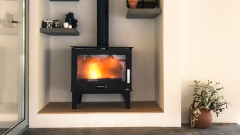 outdoor fireplace within Camtina at Quinta Camarena