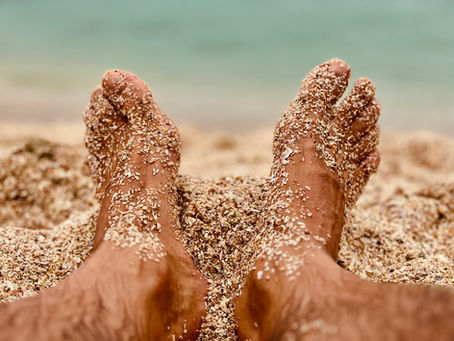 bare feet in sand