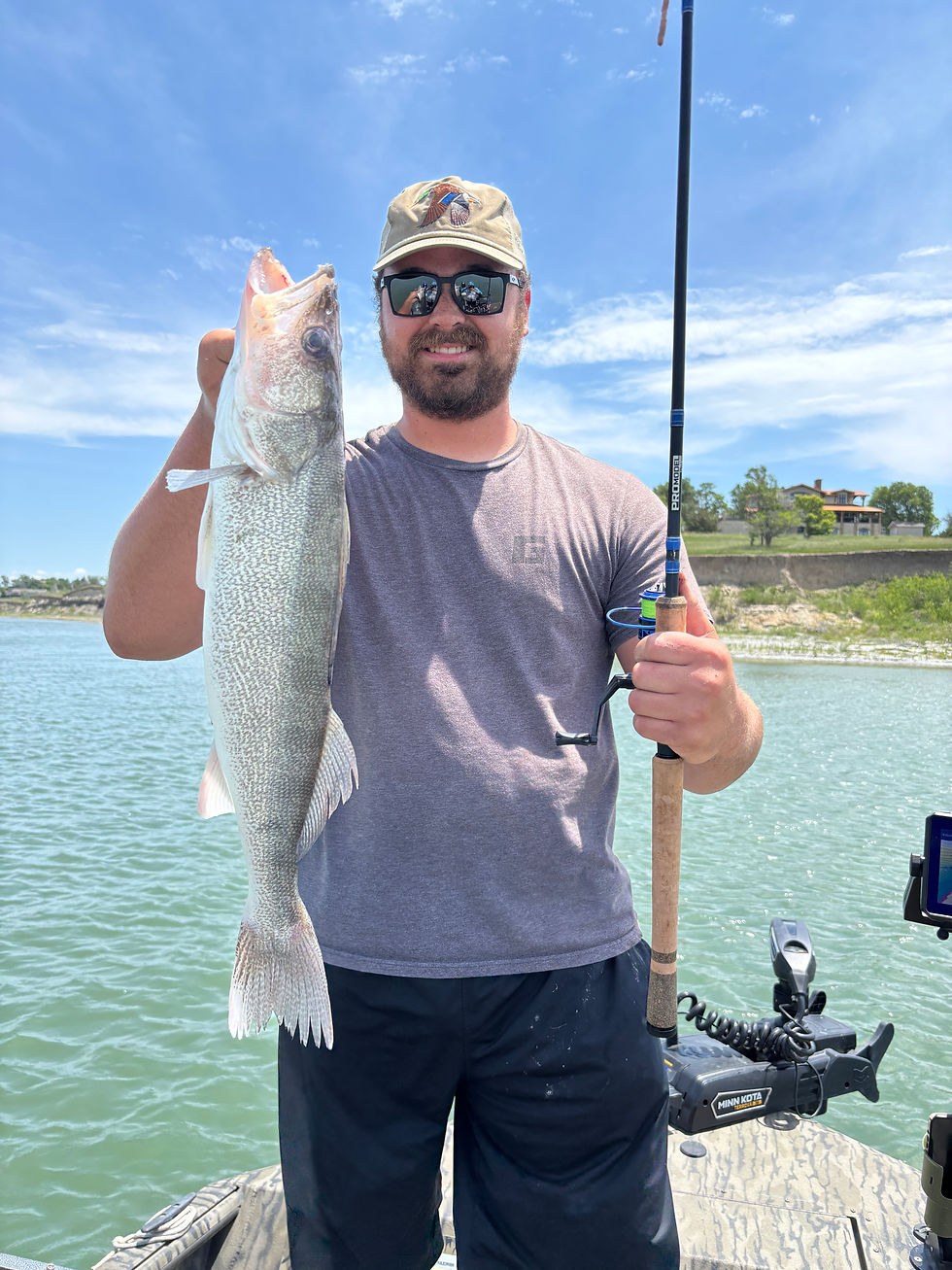 Sam with a 25" Nebraska Walleye