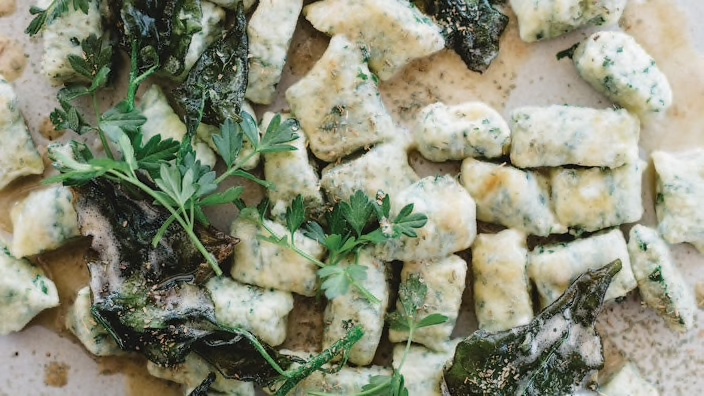 Green gnocchi with cinnamon myrtle burnt
