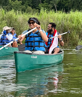 CANOE TRIP SECTION-Members of Outdoor Afro DMV enjoying their canoe trip with guid Dave He