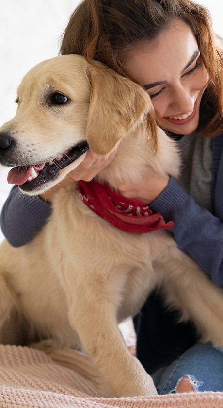 medium-shot-woman-holding-dog.jpg