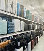  "Exterior view of Apex Luggage Store showcasing premium luggage and accessories."