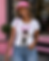 a black woman posing in an afro anime graphic tee that says beauty