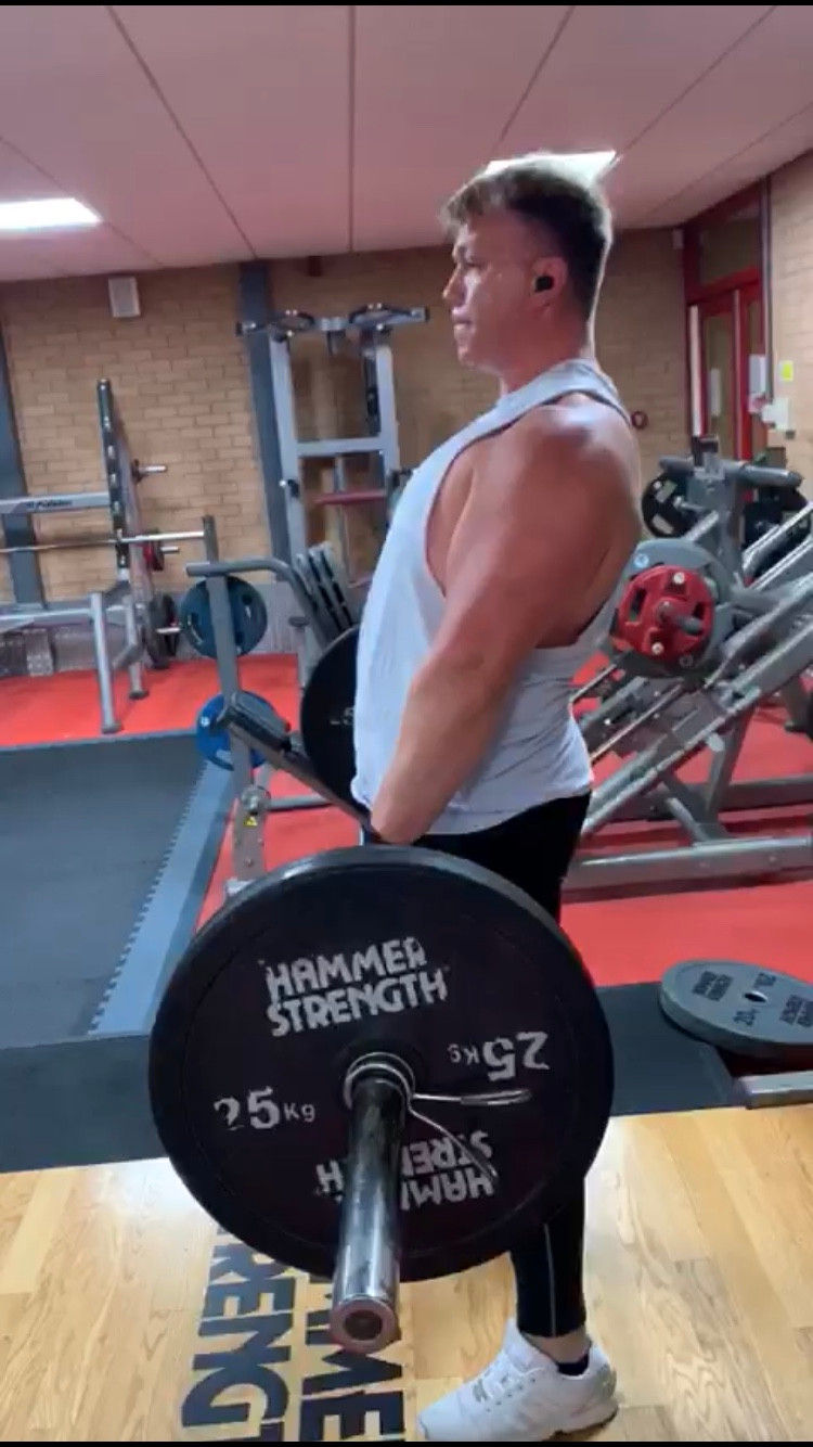 man lifting weights