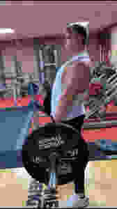 man lifting weights