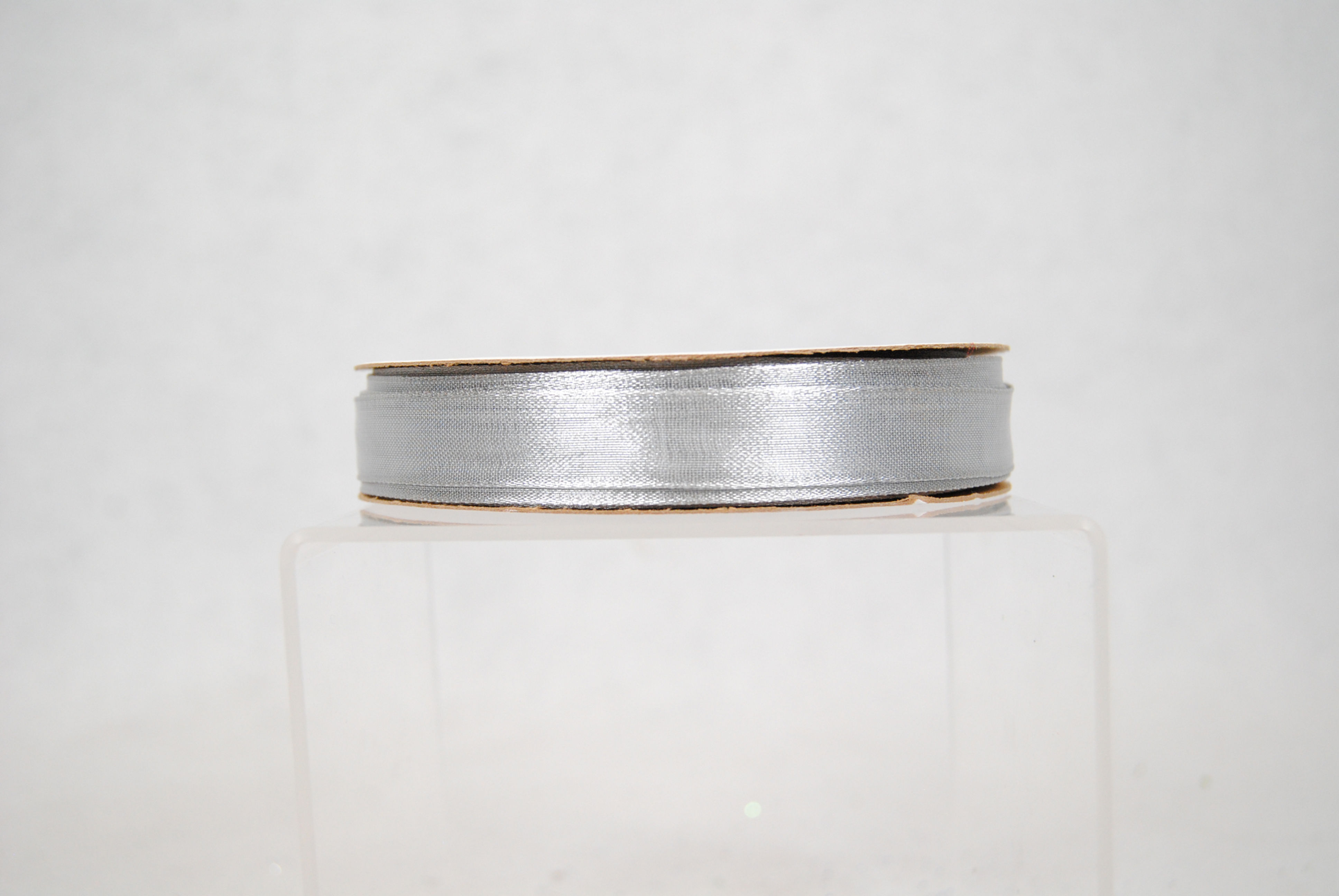 RIBBON MAGIC 5/8 SILVER 100YD