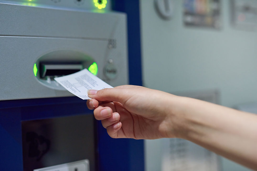 Cropped shot of an unrecognizable person inserting a ticket into a meter