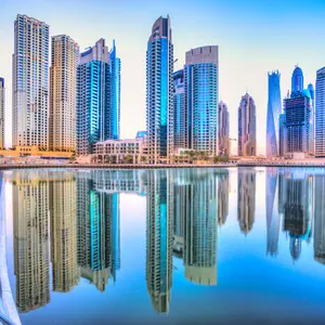 dubai-skyline-at-dusk-jpg_header-144981.webp