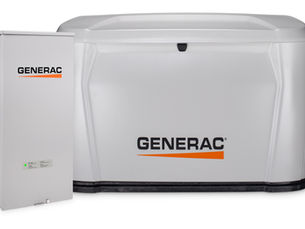 Generac standby generator installed outside home in Kingston Ontario providing backup power during winter outages