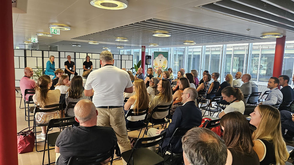 Audience at a panel discussion at the Leadership event of Living in Nyon