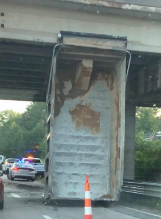 Dump truck with bed raised causes major traffic tie-up on I-20 Tuesday