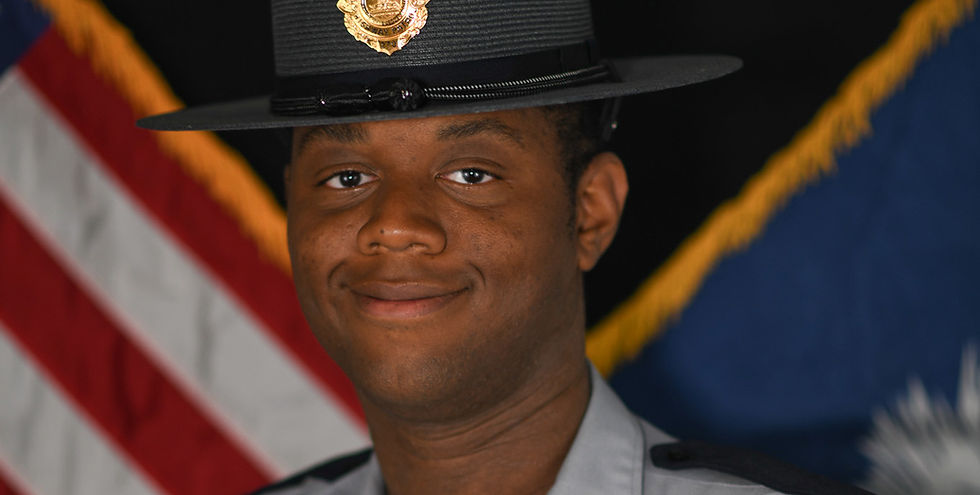 State Trooper 1st Class Dennis D. Ricks