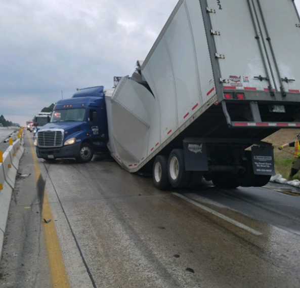 Jackknifed tractor trailer has I20 blocked at Cedarcrest Road overpass