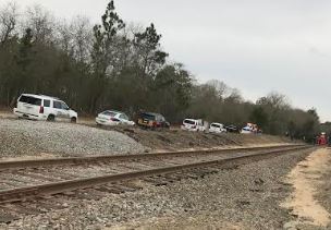 Train hits, kills, man walking track