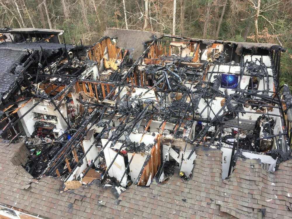 Eight families lose their homes in an apartment building fire this