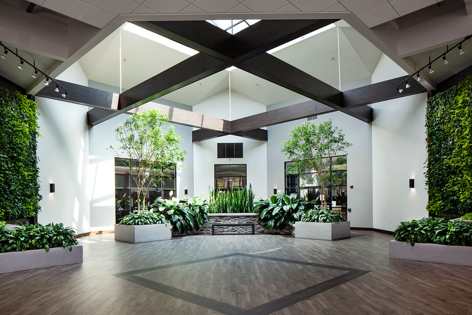 Kahn Lobby. Interior design.  Live wall. Planters. Ceiling Structure. Interior renovation. Commercial. 