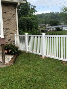 Flat top white vinyl fence. Click to visit apluscontractors.us/fencing-services