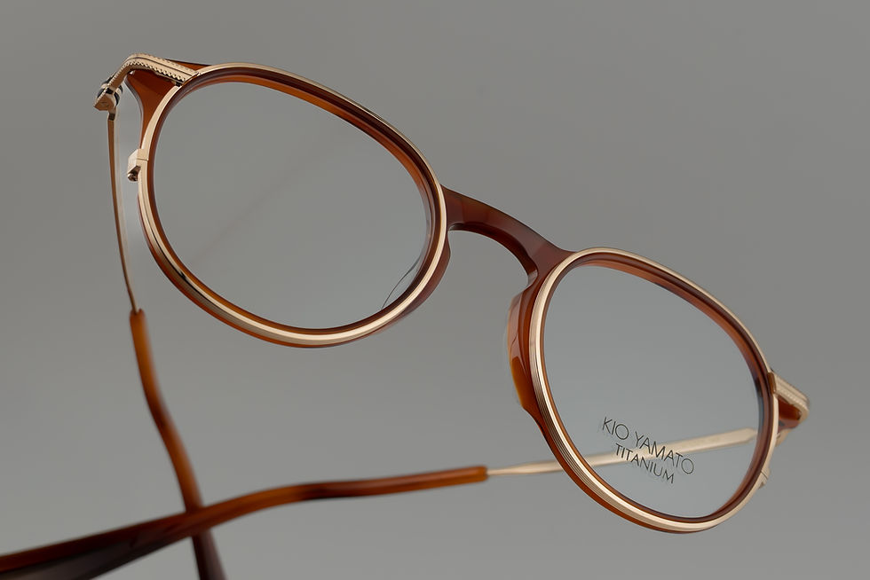 KP-283U is a frame from kio yamato that is a titanium and acetate combination frame this color is in japanese gold and light havana