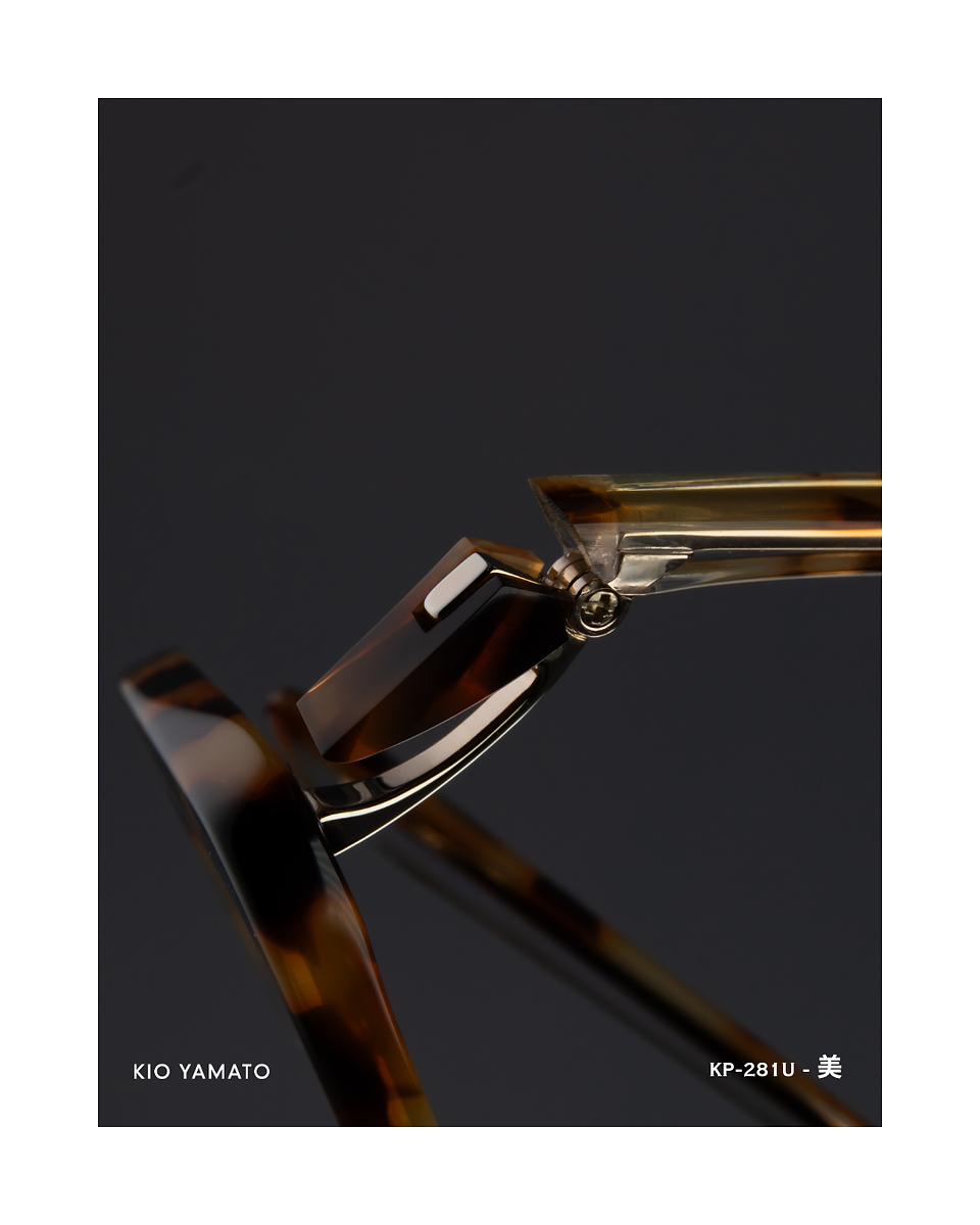 Side view of KP-281U eyeglasses, showing the full frame profile with translucent tortoiseshell acetate and balanced proportions.