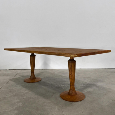 Custom oak pedestal table with brass accent