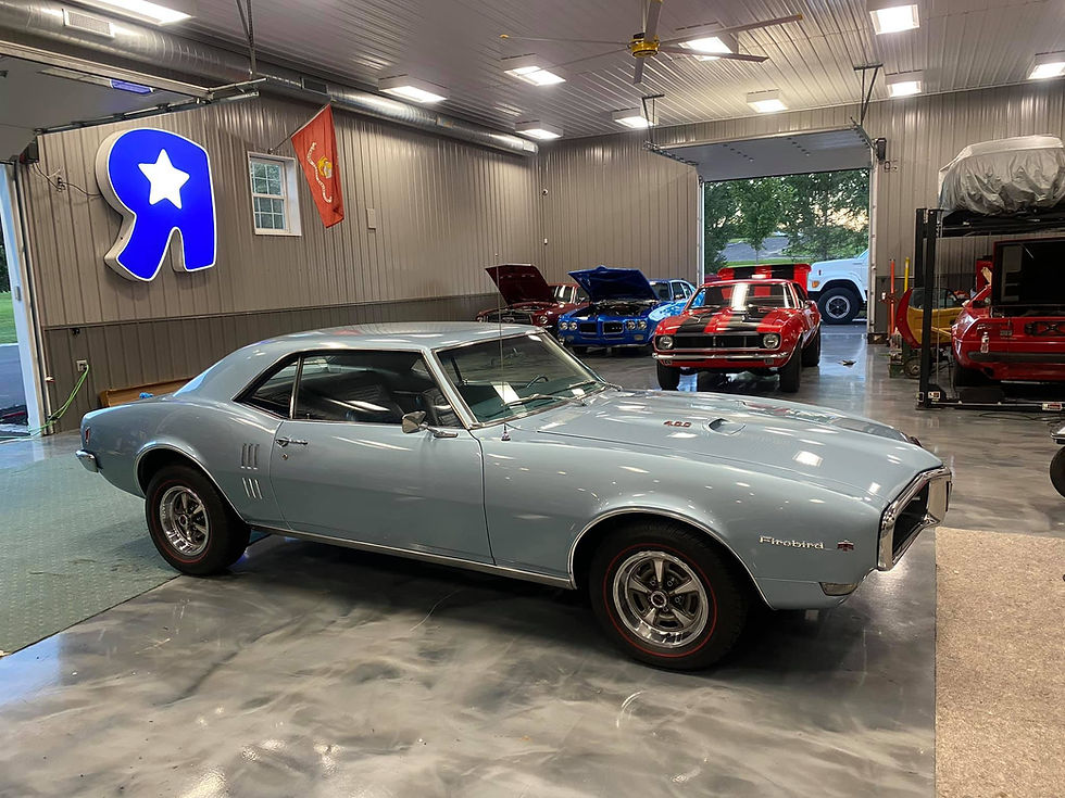 Ceramic coating service offered by Benson's Auto Detailing, shown on a restored classic vehicle.