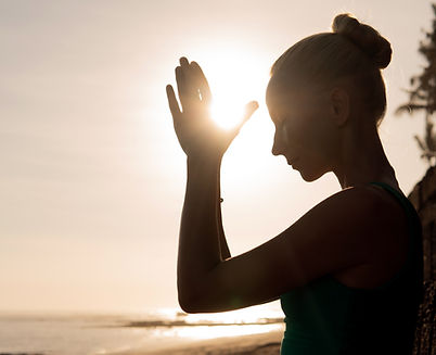 beautiful-woman-meditating-outdoors.jpg