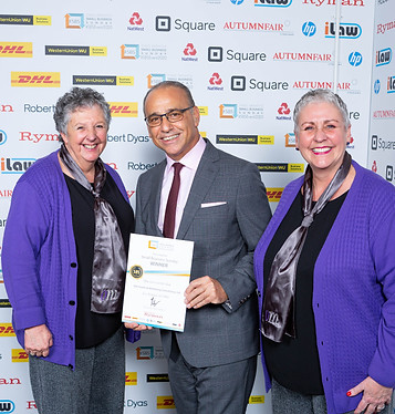 Annie & Sue receiving an Small Business Sunday winners certificate from Theo Paphitis