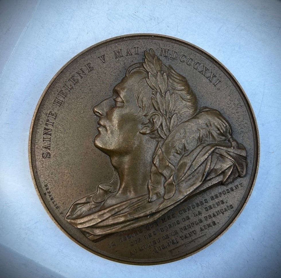 A bronze relief medallion by Depaulis depicting Napoleon lying dead