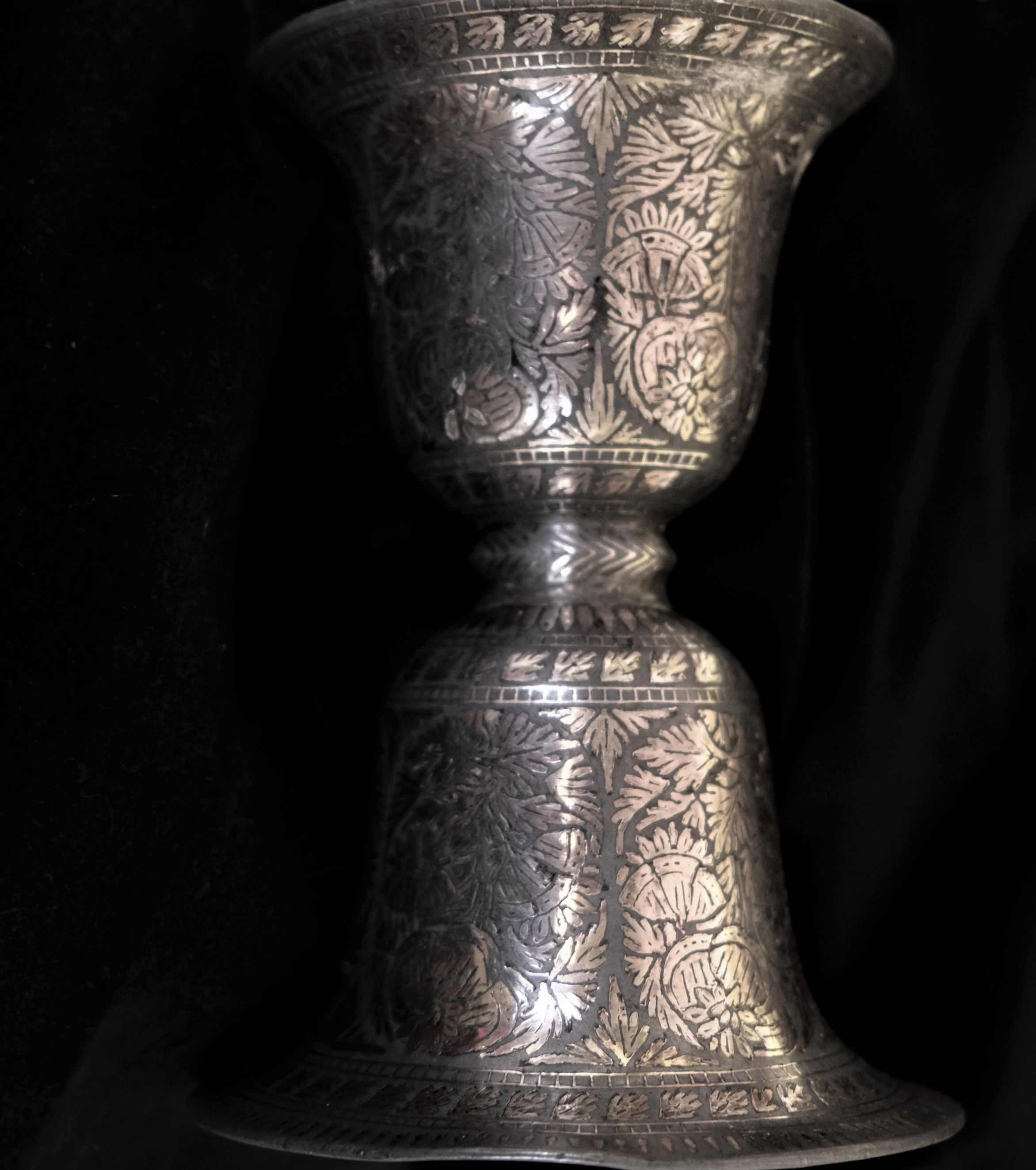 A 19th century Indian Bidri work spittoon decorated with flowers, 15 x 9cm high